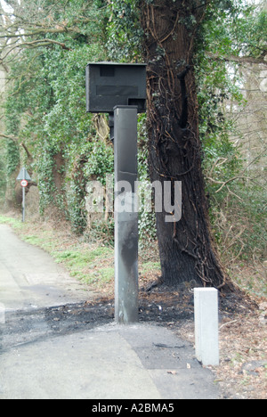 Roadside fixed speed safety camera after being damaged by fire Stock Photo