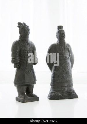 two Chinese carved wooden figures about 12' / 300mm in height Stock Photo