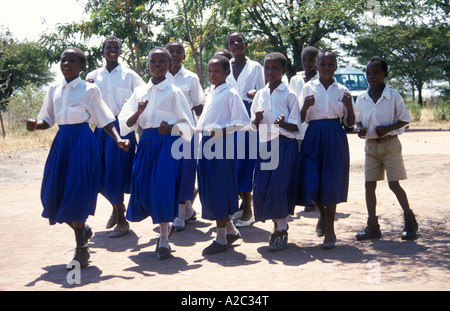 children from a World Vision Project in Nyabubunza in Tanzania in Africa performing a traditional dance Stock Photo