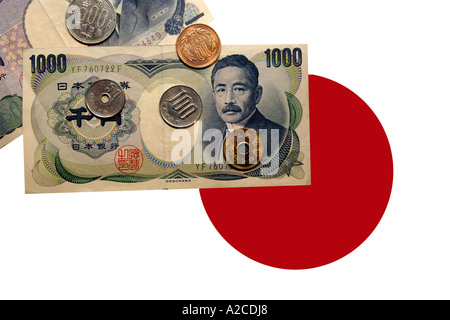 Japanese 1000 Yen notes and coins against a flag background. Stock Photo