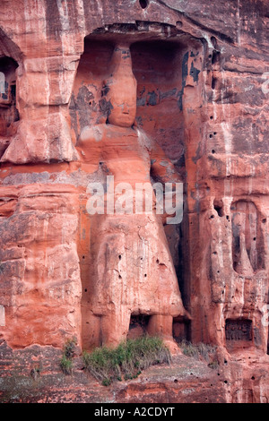 Guardian figure carved into the cliff near the Dafo of Le Shan in South West China Stock Photo