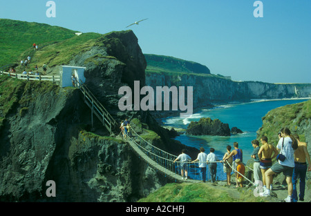 people are queuing to cross the rope bridge from Carrick-a-Rede Island back to the mainland