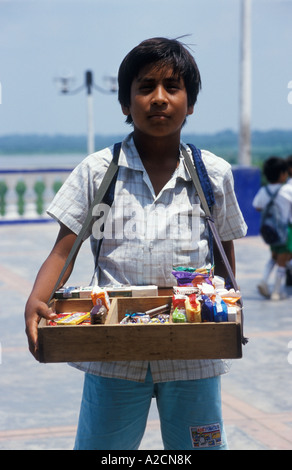 boy with a hawker´s tray in Iquitos in Peru Stock Photo