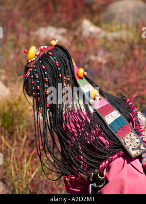 Tibetan girl with amazing braids Stock Photo