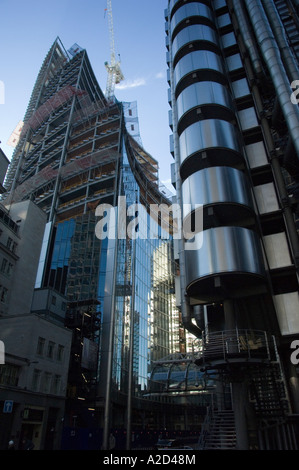 New partly glazed office development in the city of London December 2006 with the Lloyds building to the right Stock Photo