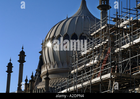 The domes of the Prince Regents Palace The Royal Pavilion Brighton East Sussex are covered in scaffolding for stonework repairs Stock Photo