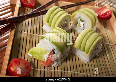 maki rolled in avocado stripes Stock Photo