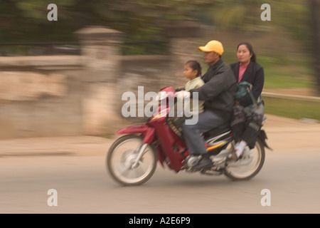 Asia, Laos, Luang Probang, Family on motorbike Stock Photo