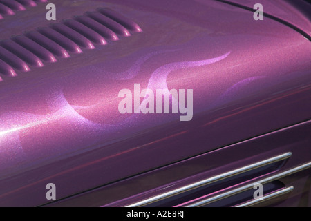 Close up of subtle flames paint job on a purple street rod Stock Photo