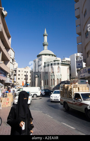 Dubai Deira old city center mosc veiled women with Burqa Stock Photo
