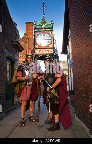 Roman Legionnaires in front of the Eastgate Clock on the City Walls, Chester, Cheshire, England, UK Stock Photo