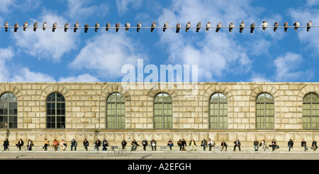people and birds in Munich Bavaria Germany Europe Stock Photo
