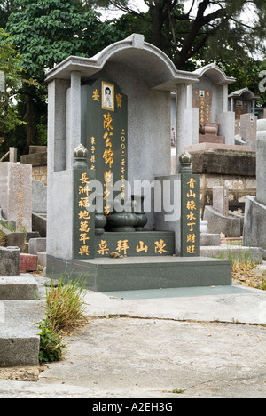 dh Chinese graveyard CHEUNG CHAU HONG KONG Decorative gravestone in cemetery stones