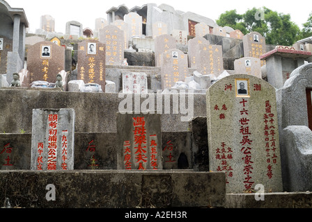 dh Chinese graveyard CHEUNG CHAU HONG KONG Gravestone in cemetery stones graves