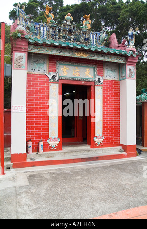 dh Chinese Tin Hau temple CHEUNG CHAU HONG KONG Shrine front entrance door taoism nobody taoist china daoism Stock Photo