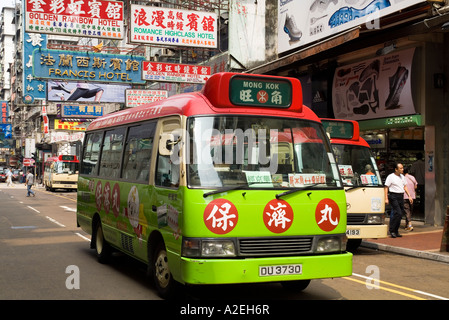 dh Red Public light bus MONG KOK HONG KONG Nonscheduled minibus service with advertising buses transport transportation mongkok street Stock Photo