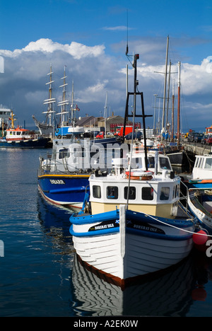 dh Kirkwall harbour KIRKWALL ORKNEY Fishing boats alongside quayside and tall ship scottish fishery industry