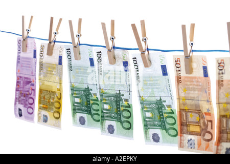 Euro notes on washing line, close-up Stock Photo