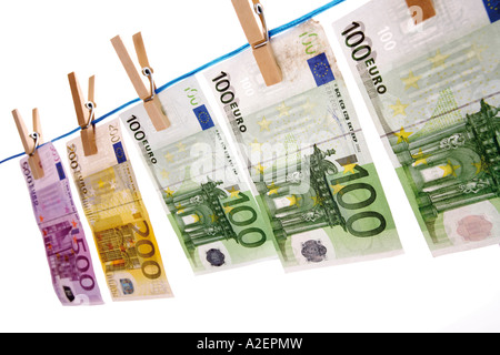 Euro notes on clothesline Stock Photo