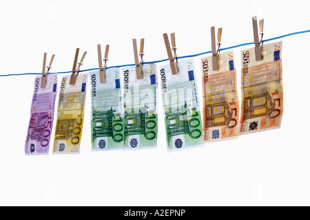 Euro notes on clothesline Stock Photo