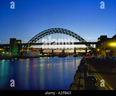 Tyne Bridges at dusk seen from the East Quayside, Newcastle upon Tyne, Tyne and Wear, England, UK. in 1980s Stock Photo