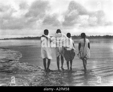 Mahatma Gandhi evening walk at Juhu Beach Bombay Mumbai Maharashtra India May 1944 Stock Photo