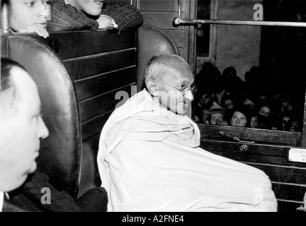 Mahatma Gandhi sitting in train Montreux France Europe on his journey from Paris to Switzerland 5 December 1931 old vintage 1900s picture Stock Photo