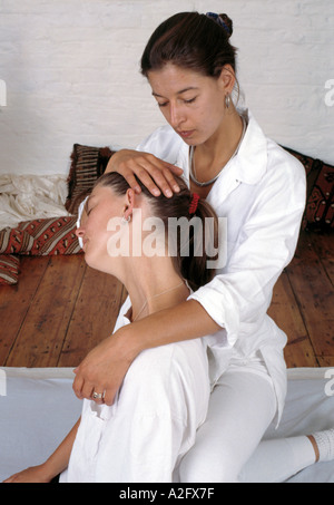 Shiatsu Massage Sitting position Neck and shoulders massage Stock Photo