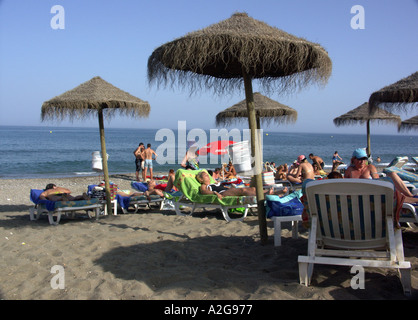 Summer Fun on the Beach Bikini Beach Chiringuito Playa de Castillo, Fuengirola, Costa del Sol, Spain Stock Photo