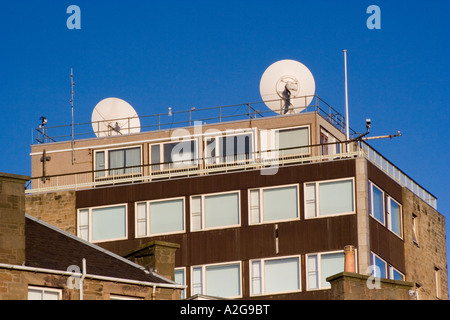 The Abertay University with two satellite dishes on the rooftop in Dundee, UK Stock Photo