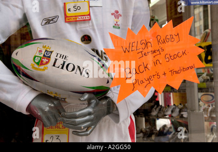 Rugby display in sports shop window in Cardiff city centre South Wales UK Stock Photo