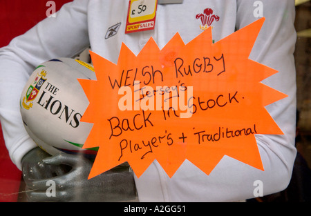 Rugby display in sports shop window in Cardiff city centre South Wales UK Stock Photo