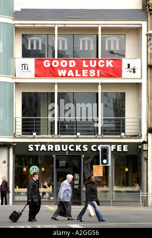 Sign above Starbucks Coffee saying GOOD LUCK WALES in Cardiff city centre Wales UK refering to the Wales rugby team Stock Photo