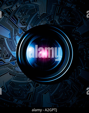 Close up of a camera lens on a circuit board background Stock Photo