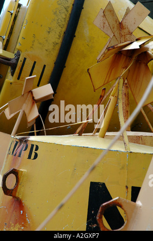 Yellow navigational buoys stacked in a dockyard in Northern France Stock Photo