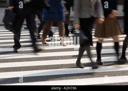 Japan, Tokyo, Pedestrians crossing street, Ginza Stock Photo