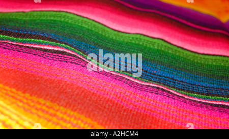 Detail of brightly coloured woven shawls zut from Chichicastenango Guatemala Stock Photo