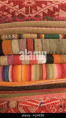 Stack of Andean fabrics from Peru and Bolivia As sold in the markets of La Paz Bolivia and Cuzco Pisac Peru Stock Photo