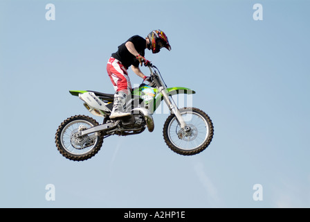 free style motorcross motor cross moto X motoX extreme sport danger jump wheelie wild motor bike cycle motorbike motorcycle fly Stock Photo