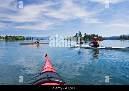 Sea kayaking at Somers Bay Flathead Lake with Silver Moon Kayaks ...