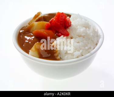 Japanese Yasai vegetable curry served with rice and garnished with red pickles Stock Photo