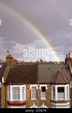 Double rainbow over terraced houses West Hampstead London UK Stock Photo