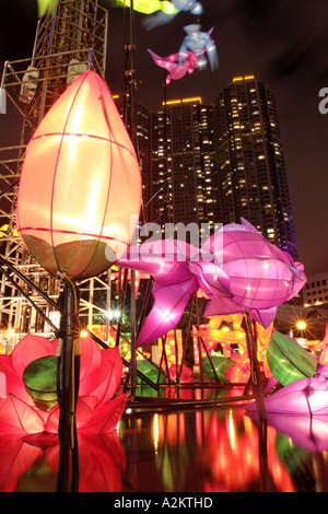 Illuminated lanterns above pond in celebration of Mid Autumn Festival Kowloon Park Tsim Sha Tsui Kowloon Hong Kong SAR Stock Photo