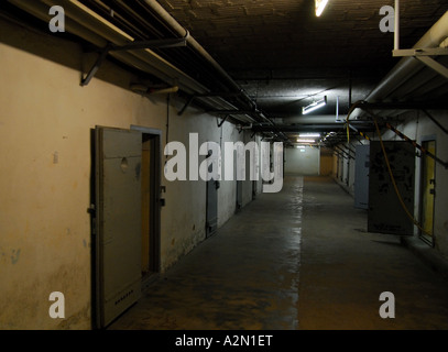 Corridor lined by prison cells, former East German prison Stock Photo ...