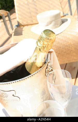 High angle view of Champagne bottle in ice bucket Stock Photo