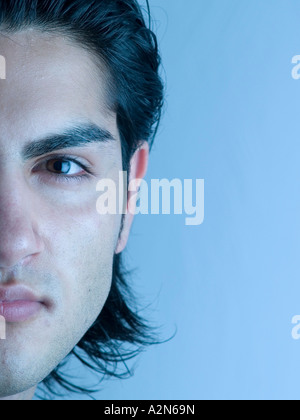 Close-up of young man thinking Stock Photo