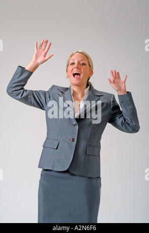 Businesswoman in business suit standing on white background Stock Photo ...