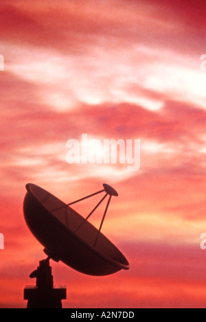Satellite dish at sunset Stock Photo