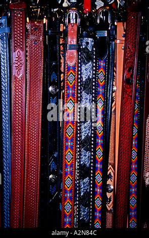 Western wear belts on rack USA Stock Photo