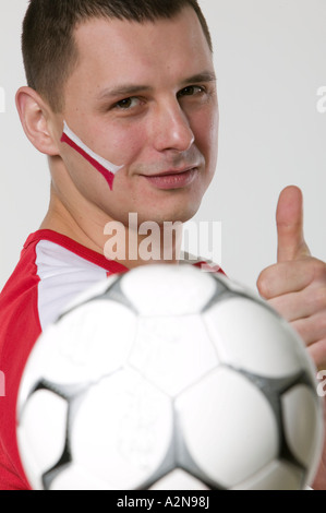 Portrait of man showing thumbs up Stock Photo